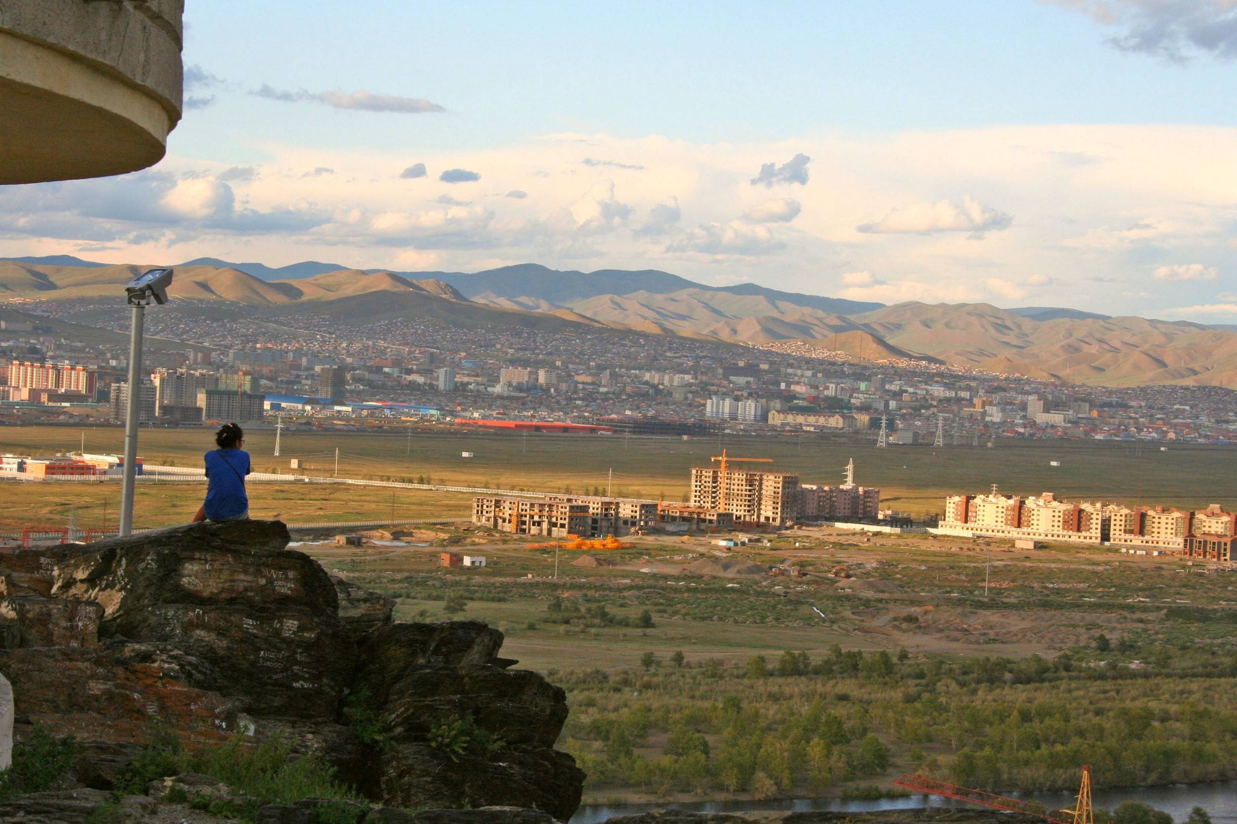 Person overlooking Ulaanbaatar cityscape