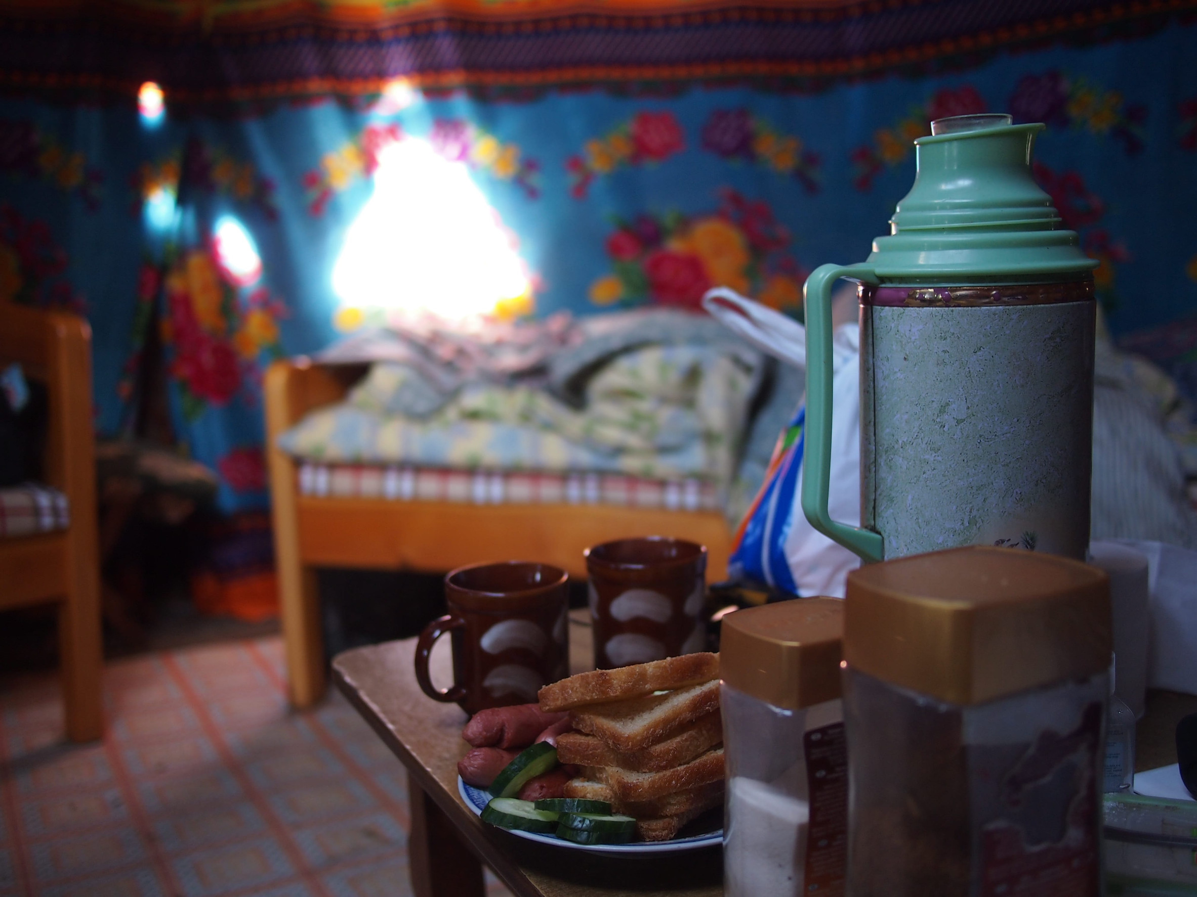 Tea and snacks are offered inside a Mongolian ger